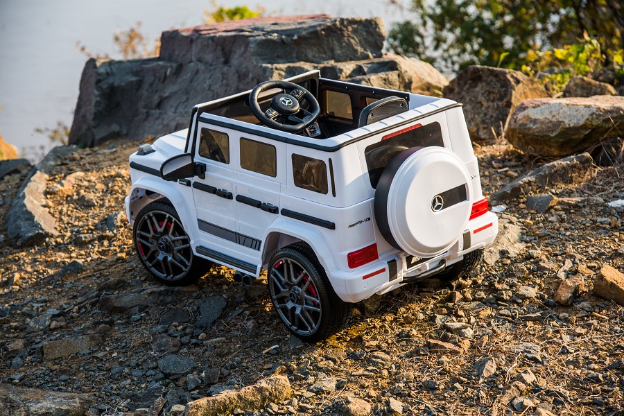 Kinderfahrzeug - Elektro Auto "Mercedes G63 AMG" - Lizenziert - 12V7AH Akku,2 Motoren- 2,4Ghz Fernsteuerung, MP3+Ledersitz+EVA-Weiss-18402